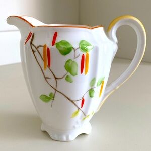 CROWN CHINA LARGE CREAMER/SAUCE JUG IN GREEN, ORANGE AND YELLOW